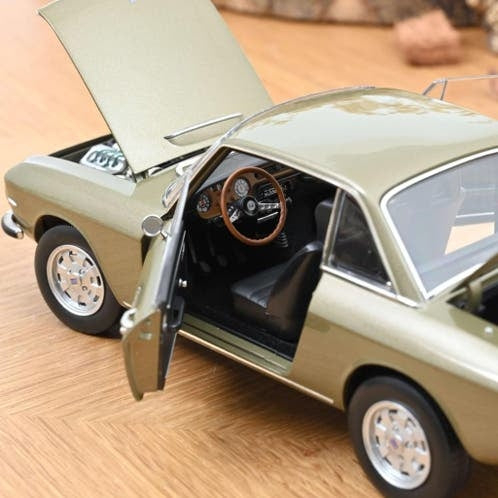 Lancia Fulvia 1971 Bronce Longchamps / 1:18 / Norev