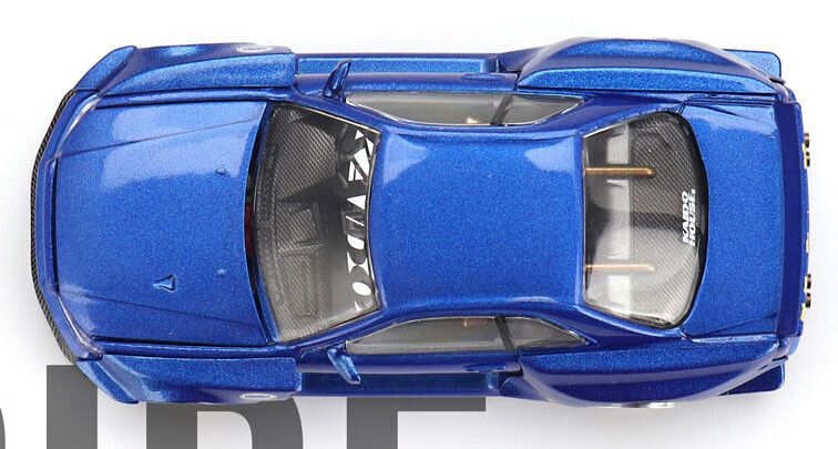 Nissan Skyline GT-R (R34) Kaido Works Shinjuku V2 '99 1:64