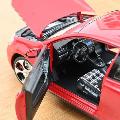 VW Golf GTI 2009 Tornado Red / 1:18 / Norev