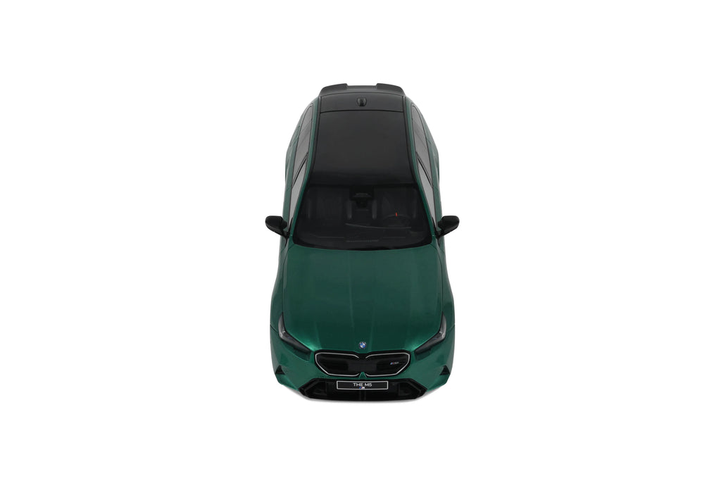BMW M5 Touring '24, groen (Isle of Man green)